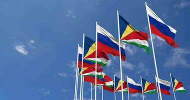 Seychelles and Russia Flags Waving Together in the Sky, Seamless Loop in Wind, Space on Left Side for Design or Information, 3D Rendering video