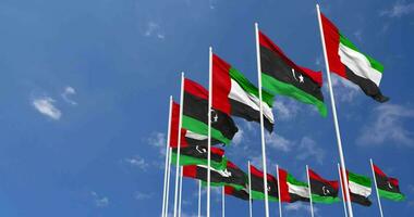Libia y unido árabe emiratos, uae banderas ondulación juntos en el cielo, sin costura lazo en viento, espacio en izquierda lado para diseño o información, 3d representación video