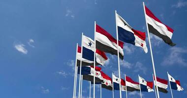 Panama and Yemen Flags Waving Together in the Sky, Seamless Loop in Wind, Space on Left Side for Design or Information, 3D Rendering video