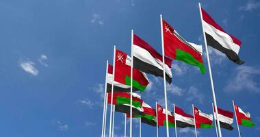 Oman and Yemen Flags Waving Together in the Sky, Seamless Loop in Wind, Space on Left Side for Design or Information, 3D Rendering video