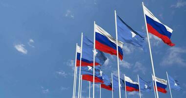 Somalia and Russia Flags Waving Together in the Sky, Seamless Loop in Wind, Space on Left Side for Design or Information, 3D Rendering video