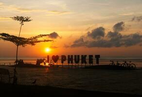 Beautiful sky in the morning at Saphanhin public beach, Phuket, Thailand. photo