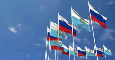San Marino and Russia Flags Waving Together in the Sky, Seamless Loop in Wind, Space on Left Side for Design or Information, 3D Rendering video