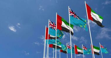 Tuvalu and United Arab Emirates, UAE Flags Waving Together in the Sky, Seamless Loop in Wind, Space on Left Side for Design or Information, 3D Rendering video