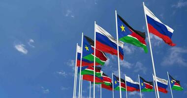 South Sudan and Russia Flags Waving Together in the Sky, Seamless Loop in Wind, Space on Left Side for Design or Information, 3D Rendering video