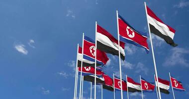 North Korea and Yemen Flags Waving Together in the Sky, Seamless Loop in Wind, Space on Left Side for Design or Information, 3D Rendering video