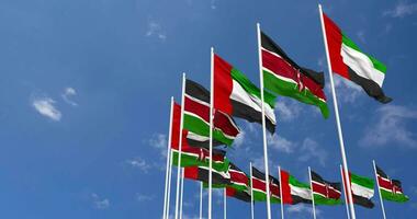 Kenya et uni arabe émirats, Émirats arabes unis drapeaux agitant ensemble dans le ciel, sans couture boucle dans vent, espace sur la gauche côté pour conception ou information, 3d le rendu video