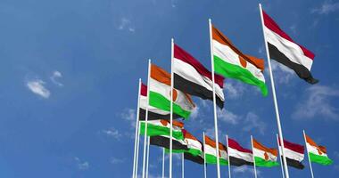 Niger and Yemen Flags Waving Together in the Sky, Seamless Loop in Wind, Space on Left Side for Design or Information, 3D Rendering video