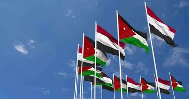 Jordán y Yemen banderas ondulación juntos en el cielo, sin costura lazo en viento, espacio en izquierda lado para diseño o información, 3d representación video
