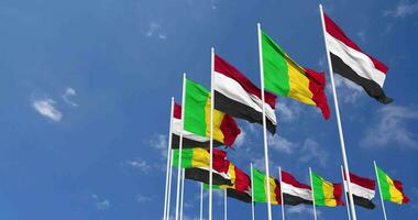 Mali and Yemen Flags Waving Together in the Sky, Seamless Loop in Wind, Space on Left Side for Design or Information, 3D Rendering video