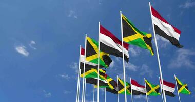 Jamaica and Yemen Flags Waving Together in the Sky, Seamless Loop in Wind, Space on Left Side for Design or Information, 3D Rendering video