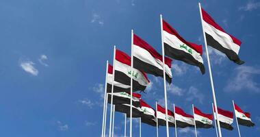 Iraq and Yemen Flags Waving Together in the Sky, Seamless Loop in Wind, Space on Left Side for Design or Information, 3D Rendering video