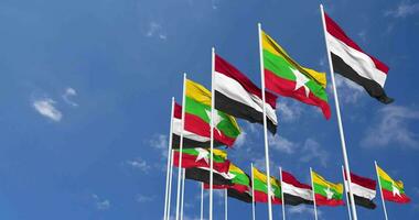 Myanmar, Burma and Yemen Flags Waving Together in the Sky, Seamless Loop in Wind, Space on Left Side for Design or Information, 3D Rendering video