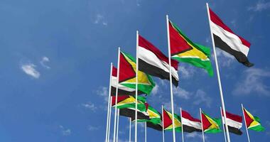 Guyana and Yemen Flags Waving Together in the Sky, Seamless Loop in Wind, Space on Left Side for Design or Information, 3D Rendering video