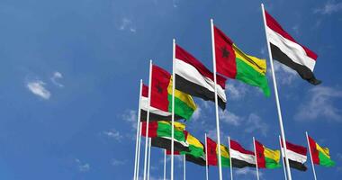 Guinea Bissau and Yemen Flags Waving Together in the Sky, Seamless Loop in Wind, Space on Left Side for Design or Information, 3D Rendering video