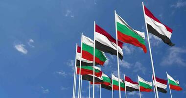 Bulgaria and Yemen Flags Waving Together in the Sky, Seamless Loop in Wind, Space on Left Side for Design or Information, 3D Rendering video