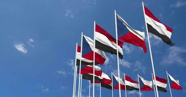 Czech Republic and Yemen Flags Waving Together in the Sky, Seamless Loop in Wind, Space on Left Side for Design or Information, 3D Rendering video