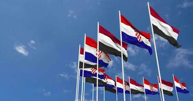 Croacia y Yemen banderas ondulación juntos en el cielo, sin costura lazo en viento, espacio en izquierda lado para diseño o información, 3d representación video