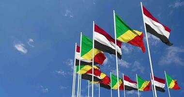 Congo and Yemen Flags Waving Together in the Sky, Seamless Loop in Wind, Space on Left Side for Design or Information, 3D Rendering video