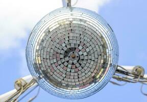 Stroboscope hanging on the wires. Stroboscope for a street disco. photo