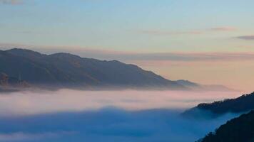 A timelapse of the sea of clouds at the top of the mountain in Kyoto telephoto shot zoom video