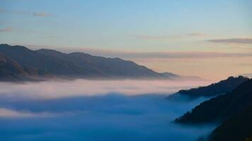A timelapse of the sea of clouds at the top of the mountain in Kyoto telephoto shot tilt video