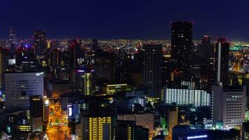 un amanecer lapso de tiempo de panorama paisaje urbano en Osaka inclinación video