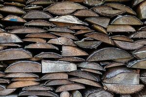 Spruce wood in the background. Firewood stack. photo