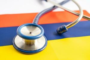Stethoscope on Armenia flag background, Business and finance concept. photo