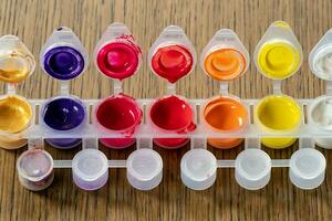 Palette mix watercolors. Children's watercolor paints. Colorful watercolor box. photo