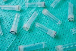 Plastic test tubes with caps for the collection of samples. Sampling tubes for laboratory examination. photo