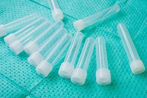Plastic test tubes with caps for the collection of samples. Sampling tubes for laboratory examination. photo