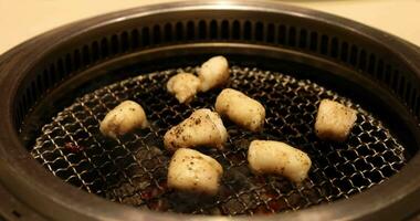 Japanese style bbq Yakiniku with Wagyu beef sliced close up handheld shot video