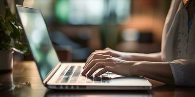 AI generated Close up of a woman hands typing on a laptop in a cozy home office setting photo