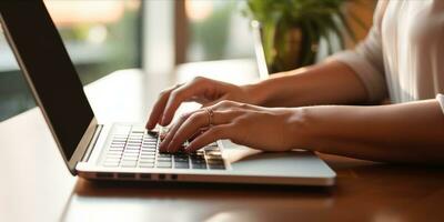 AI generated Close up of a woman hands typing on a laptop in a cozy home office setting photo