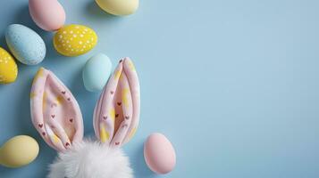 AI generated Easter party concept. Top view photo of easter bunny ears white pink blue and yellow eggs on isolated pastel blue background with copyspace in the middle