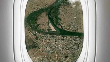 Satellite Khartoum map background loop. Airplane salon passenger seat window view. Spinning around Sudan city plane cabin air footage. Seamless panorama flies over terrain backdrop. video
