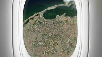 Satellite Luanda map background loop. Airplane salon passenger seat window view. Spinning around Angola city plane cabin air footage. Seamless panorama flies over terrain backdrop. video