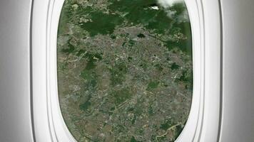 Satellite Kuala Lumpur map background loop. Airplane salon passenger seat window view. Spinning around Malaysia city plane cabin air footage. Seamless panorama flies over terrain backdrop. video