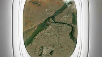 Satellite Khartoum map background loop. Airplane salon passenger seat window view. Spinning around Sudan city plane cabin air footage. Seamless panorama flies over terrain backdrop. video