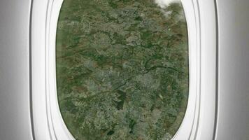 Satellite Pune map background loop. Airplane salon passenger seat window view. Spinning around India city plane cabin air footage. Seamless panorama flies over terrain backdrop. video