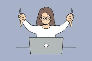Woman freelancer showing thumbs down sitting in front of laptop and making video call to colleagues while discussing future project. Girl demonstrate thumbs down as sign of negative user experience vector