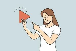 Woman holding play button suggesting start video or music from playlist and use multimedia technology. Girl points finger at large play sign designed to control media player or online cinema vector