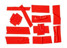 Red adhesive vinyl tape stripes in set isolated on white background with clipping path. Top view and flat lay photo