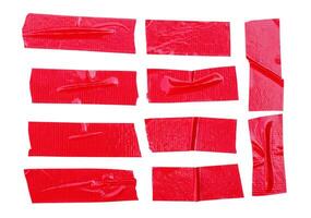 Red adhesive vinyl tape stripes in set isolated with clipping path. Top view and flat lay photo