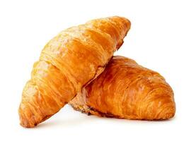 frente ver de delicioso croissants en apilar o cruzar forma aislado en blanco antecedentes con recorte camino foto