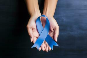 AI Generated Periwinkle blue ribbon awareness with color bow on woman's hand for stomach and small intestine cancer, esophageal cancer, eating disorder, Irritable Bowel Syndrome , IBS awareness photo