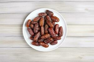 AI generated pitted dates isolated on white background, top view photo