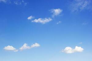 Blue sky background and white clouds soft focus, and copy space horizontal shape. photo