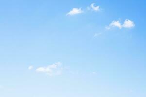 Blue sky background and white clouds soft focus, and copy space horizontal shape. photo